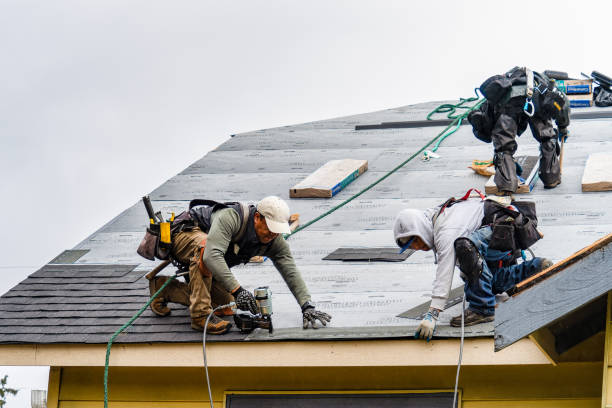 Professional Roofing technician working in Wampsville, NY